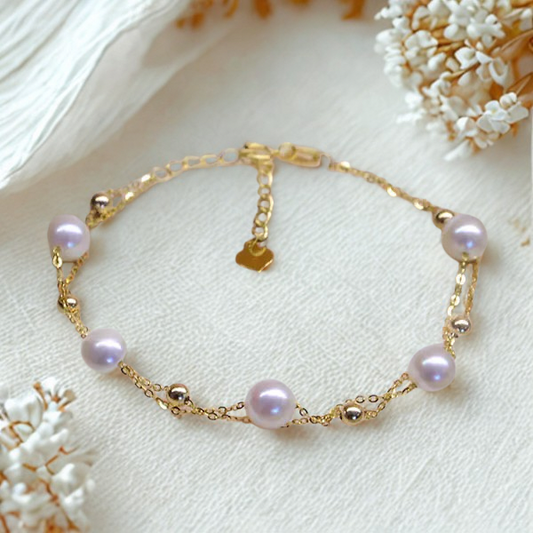 Pulsera Ajustable de Perlas de Agua de Mar y Doble Capa en Oro de 18k