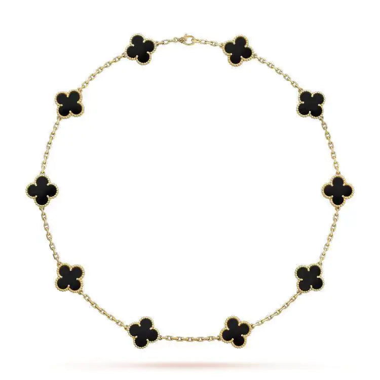 Collar de Ágata Negra Dorada con Colgante de Trébol